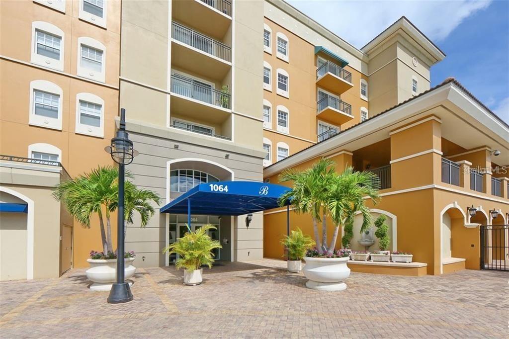 Annual UNfurnished 2/2 penthouse floor condo. The Broadway Promenade is a elegant condominium development of 187 units across the street from Sarasota Bay in the city's cultural arts district. This top floor unit is bright and cheery and filled with natural light from two slidin glass doors. Partial view of Pioneer Park and the city will be a treat. The kitchen boasts slab granite counter tops, stainless steel appliances, a breakfast bar, pass thru to dining area, and a pantry. The master bedroom has a TWO large walk-in closet, and en-suite bathroom with huge soaking tub and separate walk-in shower. Balcony off the master for enjoying your morning coffee with another giant storage closet. The 2nd bedroom has a double closet. There is one additional storage closet right outside your front door and cubicle storage too. The building has 24-hr concierge with long-term, caring staff, resort-style heated pool and spa, BBQ grills, and outdoor or covered dining, well-equipped fitness center, with locker room and sauna, club room with full kitchen and bar, library, activity room with business center, pool table, and seating area with large screen TV, guest suites and more! Publix is right outside your front door, and The Van Wezel and Municipal Auditorium are across the street, and a lot of shopping and dining located nearby. The cherry on top is a parking spot in an underground garage. Sorry, no pets per the association. Call now, so you don't miss out on this one. NOTE: This community is governed by a homeowners association. Approval may include an application, background screening, fees, and an approval process. Contact the agent for details.