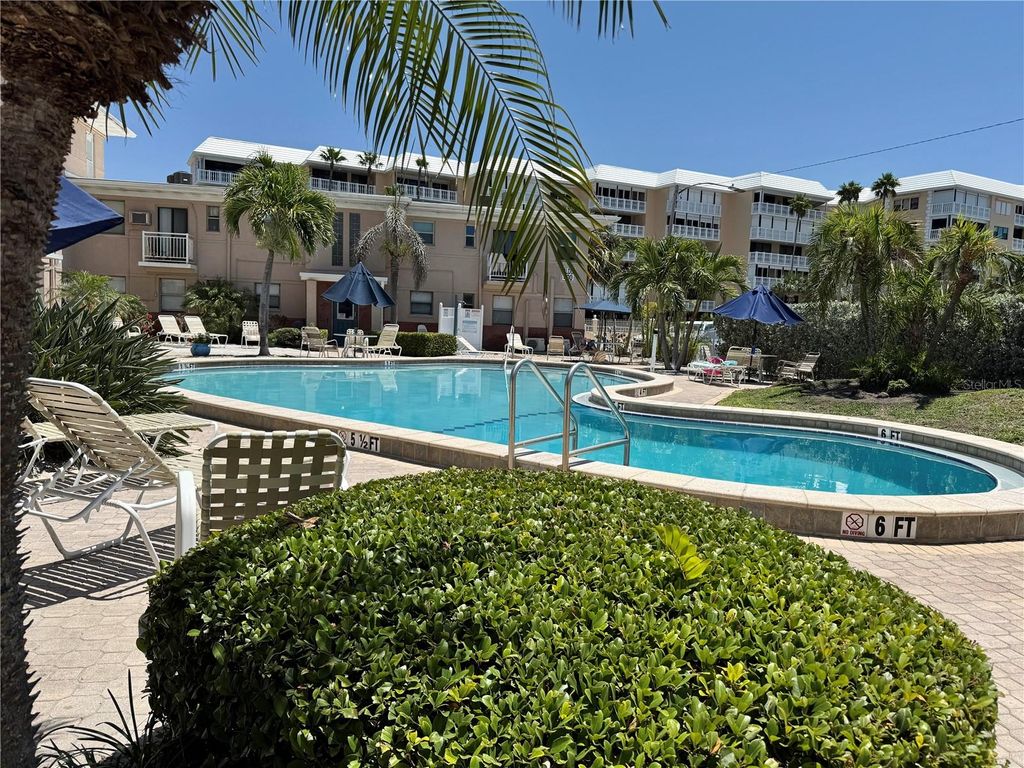 Photo of 6700 Sunset Way #206, St Pete Beach, FL 33706 (MLS # TB8441041)