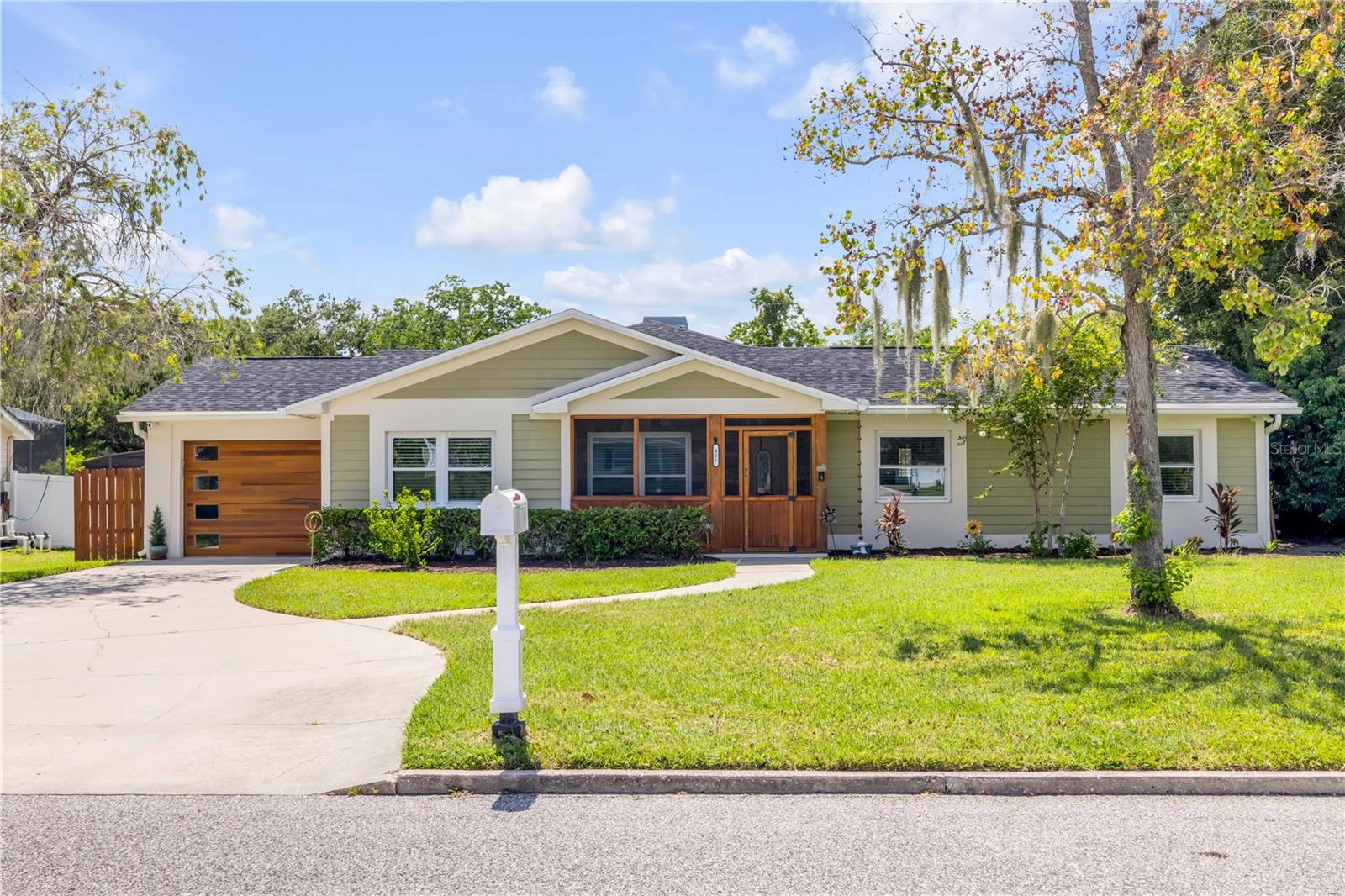 One or more photo(s) has been virtually staged. Welcome to your personal retreat in the heart of Winter Garden! Just a short stroll from the charm of historic Plant Street. This meticulously maintained 3-bedroom, 3-bath pool home with a dedicated office blends relaxed luxury with everyday function in one of Central Florida's most walkable, vibrant neighborhoods and with no HOA to limit your lifestyle. Step inside to find beautiful wood-look tile throughout, an open kitchen with stainless steel appliances, and an expansive 34'x19' family room with vaulted ceilings centered around a stunning floor-to-ceiling stone fireplace. French doors open to your private backyard oasis, where a resort-style heated pool and spa (new pump 2024, new heater 2025) are surrounded by lush planting beds, a gas fire pit, and a covered dining area that's perfect for hosting year-round. The luxurious primary suite is a true retreat, featuring a spa-like bath with a huge walk-in shower, double vanities, a soaking tub, and a custom walk-in closet. Practical updates include a new roof and AC (2022), new windows (2017), and water heater (2018), giving you peace of mind and turnkey convenience. Privacy is guaranteed with a full vinyl fence, and the gated rear alley access makes room for your boat or RV, an exceptional find in this neighborhood. Enjoy golf cart rides to the West Orange Trail, weekly farmers markets, local restaurants, and community events just minutes away.