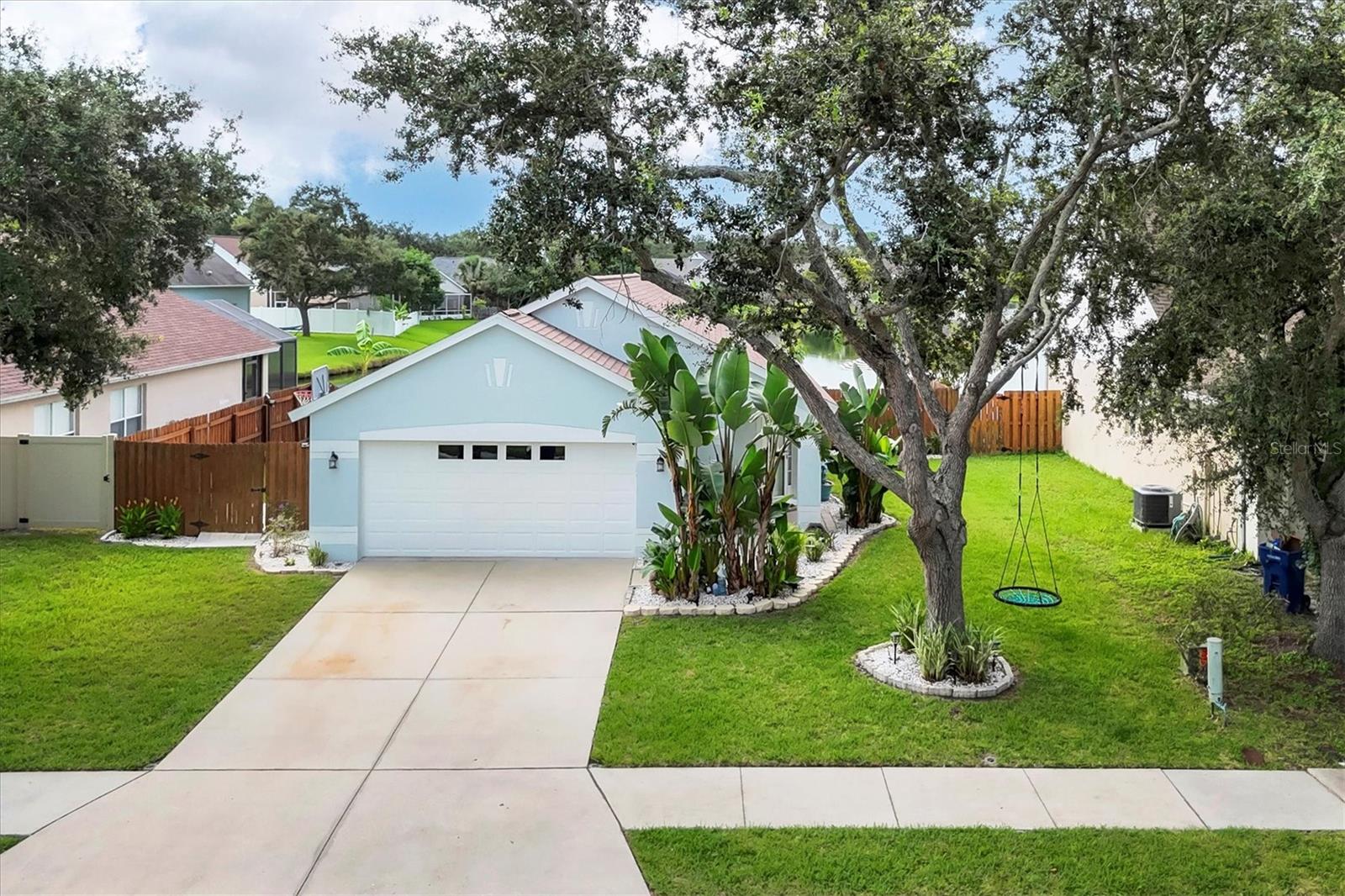 Welcome to your own little piece of paradise. This beautiful home has been lovingly upgraded to make it the perfect Florida home. Imagine waking up in the morning and drinking your coffee while watching the sun rise over your Beautiful Lake front backyard. This is one of the few Lakes that allow kayaks and canoes. Fishing is allowed. No motors allowed. It has a beautiful enclosed pool The roof was replaced in 2021, and the AC is 2012. The whole house has luxury vinyl throughout the home. Both bathrooms have been updated with new toilets and fixtures. It has a sprinkler system to keep the grass and the landscaping always looking great. The kitchen has upgraded cabinets and recessed lighting and appliances. It features vaulted ceilings, ceiling fans throughout the house. It has new blinds on the windows. The primary bedroom has a walk-in closet. There are new fixtures throughout the house. It has a oversize 2 car garage and a private lanai covered with pavers. It also has on the opposite side of the pool and enclosed back yard. This is perfect for your dogs. Fosters Creek is conveniently located minutes from The SKYWAY Bridge and 75. You are only a half hour away from Holmes Beach and the beautiful Anna Maria Island. This home is located in a X flood zone.(which is the best you can have in Fl). Please use as is contract. All room sizes are approximate.