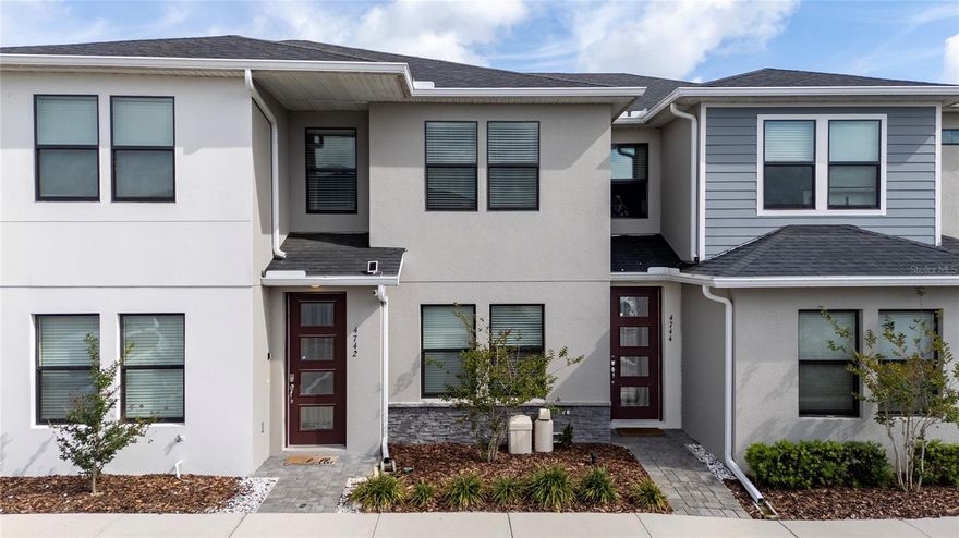 NO CDD + Sellers offering $10,000 FLEX CREDIT! Rare opportunity to own a 3-bedroom, 2.5-bath townhome with exceptional versatility in a gated community near Disney. Whether you're looking for a primary home, vacation retreat, or income producing short term rental/Airbnb, this property offers the flexibility today’s buyers are searching for. The backyard setting is truly a standout feature, with spectacular lake views, a beautiful fountain, and a peaceful wooded backdrop that creates a private and relaxing environment rarely found in similar properties. Residents enjoy access to community amenities including a pool, sauna, and playground, along with the added benefit of a well-managed HOA and NO CDD. Conveniently located near a school, and approximately 34 minutes to Walt Disney World, plus easy access to the beautiful and highly sought after Celebration area. Lovingly maintained and occupied only by its owners, this home presents a unique opportunity for personal enjoyment or strategic investment.