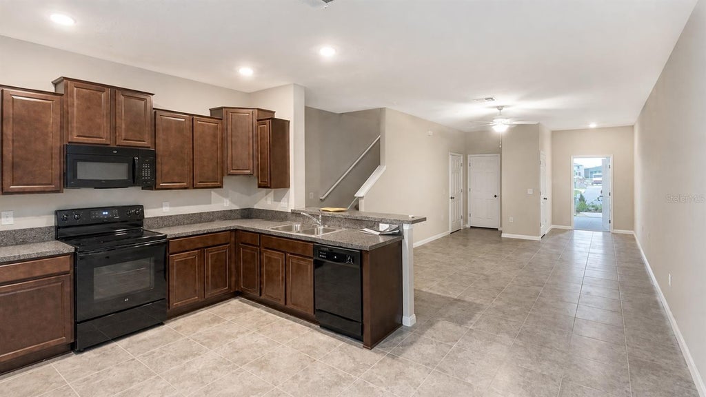 Photo of 3836 Cat Mint Street, Tampa, FL 33619 (MLS # TB8540562)