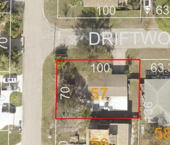 NOT SUBSTANTIALLY DAMAGED NOR DOES IT NEED TORN DOWN! Welcome to 212 Driftwood Place, a promising investment nestled in the sought-after coastal community of Baywood Village in Palm Harbor. This 3-bedroom, 2-bathroom, 2-car garage block construction home sits on an expansive fully fenced corner lot. With two gated access points - including an oversized gate ideal for RV or boat storage - this property caters perfectly to Florida living. The home features NEW WINDOWS WITH HURRICANE SHUTTERS IN 2023, allowing natural light to pour into the spacious layout. At the heart of the home is a centrally located kitchen, offering an ideal footprint for future redesign. A formal living room welcomes you at the front of the home, while a generously sized family room at the rear provides flexible space for entertaining or relaxing. A fantastic brick-faced wood-burning fireplace adds character and charm, anchoring the home's potential. While the property sustained flood damage during Hurricane Helene, it has been professionally and fully remediated, providing a blank canvas for renovations with peace of mind. Whether you're an investor, builder, or future homeowner, this is your chance to restore and customize a home in one of Palm Harbor’s most desirable neighborhoods. Cash or renovation financing required. Bring your vision and seize this rare opportunity to create value and lasting memories in Baywood Village.