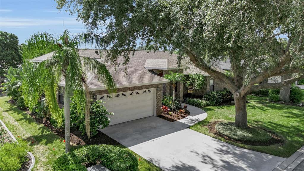 Photo of 4739 Spring Meadow Lane, Sarasota, FL 34233 (MLS # A4703325)