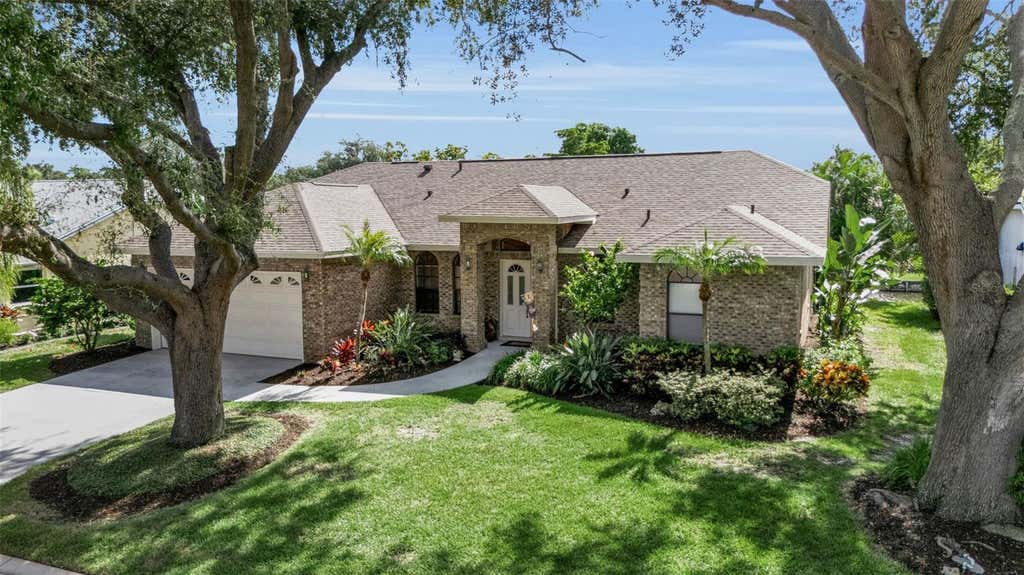 Photo of 4739 Spring Meadow Lane, Sarasota, FL 34233 (MLS # A4703325)