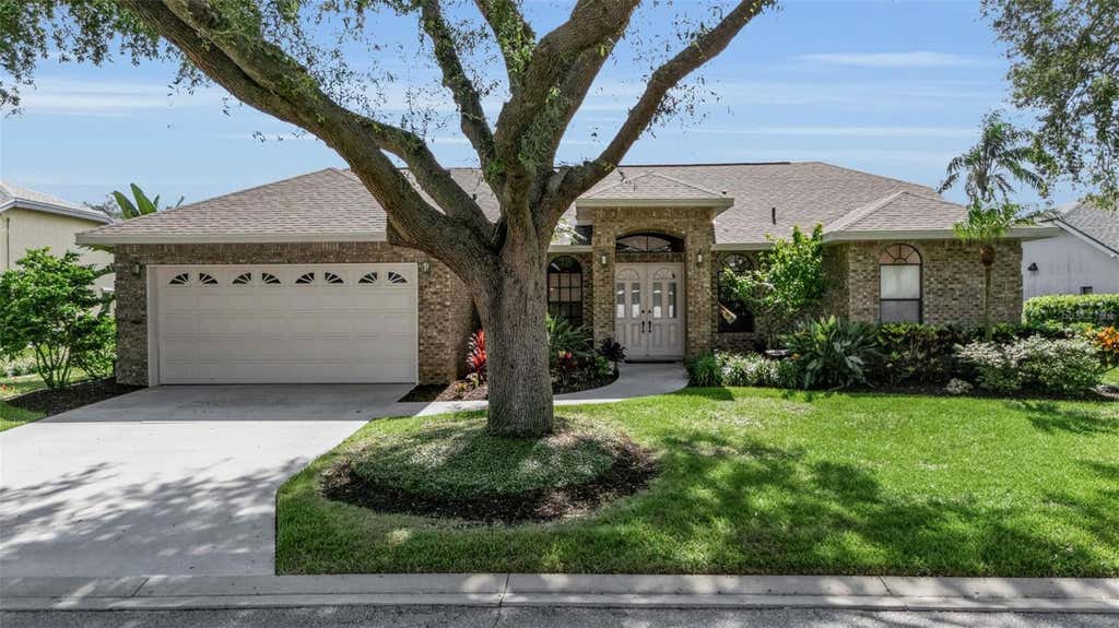Photo of 4739 Spring Meadow Lane, Sarasota, FL 34233 (MLS # A4703325)