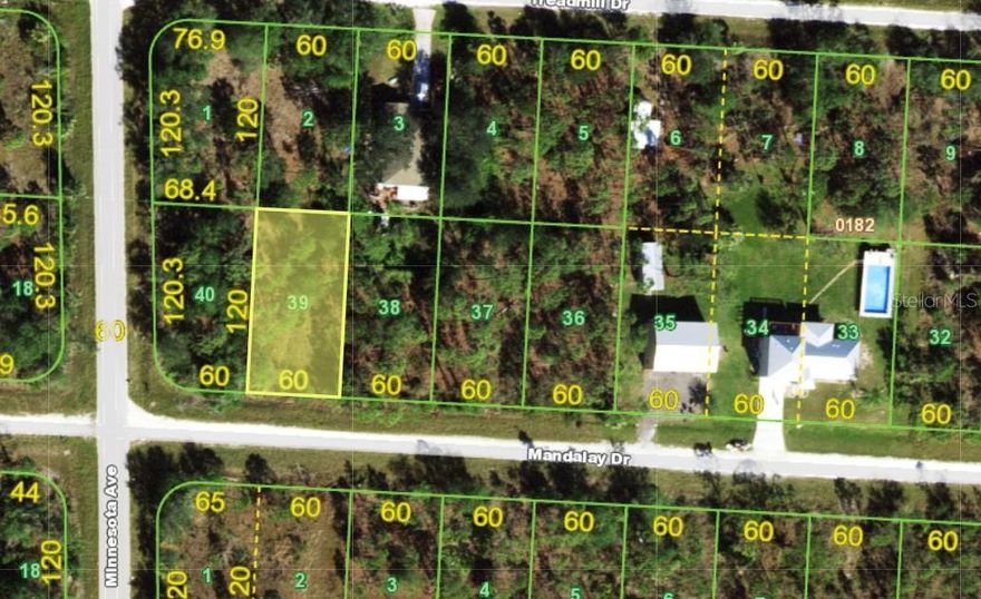 Build your dream home or invest in the future with this vacant residential lot located in the growing Tropical Gulf Acres community of Punta Gorda. Surrounded by a mix of well-maintained single-family homes and undeveloped parcels, this property offers a peaceful setting with plenty of potential. Conveniently located just minutes from Tuckers Grade, U.S. Route 41, Burnt Store Road, and Interstate 75, providing easy access to shopping, dining, boating, golf, and Southwest Florida’s beautiful Gulf Coast attractions.

Recently survey completed and available.  Property is fully staked! No HOA and no CDD fees! Whether you’re ready to build now or looking for a smart long-term investment opportunity, this lot offers flexibility and value. The adjacent parcel at 27408 Mandalay is also available — purchase both properties together for approximately 1/3 acre of combined space and added privacy.
