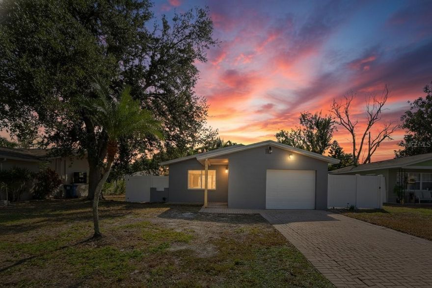 Enjoy the best of tropical living with easy access to the sandy beaches, vibrant shopping, and dining options—all just minutes away.
Welcome home to this beautifully updated home located in the desirable neighborhood of Shore Acres. As you enter the home, you will notice the seamless LVP flooring throughout which means NO CARPET. The kitchen has been thoughtfully updated with brand-new stainless-steel appliances, shaker style cabinets and stone countertops. The primary bedroom offers a walk-in closet and an en-suite that has been renovated with modern touches. The other 2 secondary bedrooms are of good size. One of the secondary bedrooms has access to the back yard via slider doors. You will also find a generous sized utility / laundry room in the home. All of the major items (roof/HVAC/HWH) have been replaced within the last 5-6 years. The yard is fully fenced and as an added bonus, you can take advantage of the solar panels that are owned free and clear! Schedule your private tour today of this St. Pete gem.