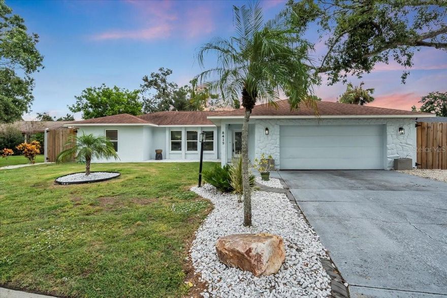 **EXQUISITLY ELEGANT and SPACIOUS HOME with MODERN FEATURES near UTC! Prepare to be dazzled! This 4-bedroom, 4-bathroom residence is more than just a visual delight, it's a haven for family and friends. The open floor plan seamlessly transitions through the home, with each room basking in natural light from the IMPACT WINDOWS and DOORS, complemented by a skylight! The kitchen is a masterpiece, featuring new white CAFE appliances with contrasting bronze hardware, gleaming quartz countertops, a timeless marble backsplash, a charming farmhouse sink, and a built-in wine cooler. There's also space for a coffee bar or baking prep area, along with a custom pantry wall that matches the kitchen cabinetry. Durable luxury vinyl plank flooring adds both style and easy maintenance...and it's throughout the home! The primary bedroom is a luxurious retreat, boasting an ensuite bath, dual walk-in closets with built-in organizers, and a massive built-in wall storage system. The master bath is pure indulgence, with a soaking tub, dual sinks in a chic vanity, and a walk-in shower equipped with a built-in bench and dual shower heads. Three guest bedrooms include one with a private ensuite bath, while the additional guest bathrooms exude elegance with modern touches. There are ample spaces throughout the home for relaxing and entertaining, making every day feel like a vacation. Stay comfortable inside all year long with a 2019 HVAC system or step outside to the fully enclosed backyard, surrounded by a custom concrete and wood fence that blends security with style. The expansive yard is perfect for large gatherings and features a built-in firepit and a space perfect for ready-to-cultivate garden area. This home has been meticulously painted inside and out, ensuring a fresh and inviting atmosphere. Ideally situated just off University Blvd on a cul-de-sac street, this location offers a quick drive to the finest shopping and dining options. It also provides convenient access to the airport, beaches, and downtown Bradenton and Sarasota, where you can enjoy vibrant nightlife and a variety of cultural and arts events. This home is not to be missed!