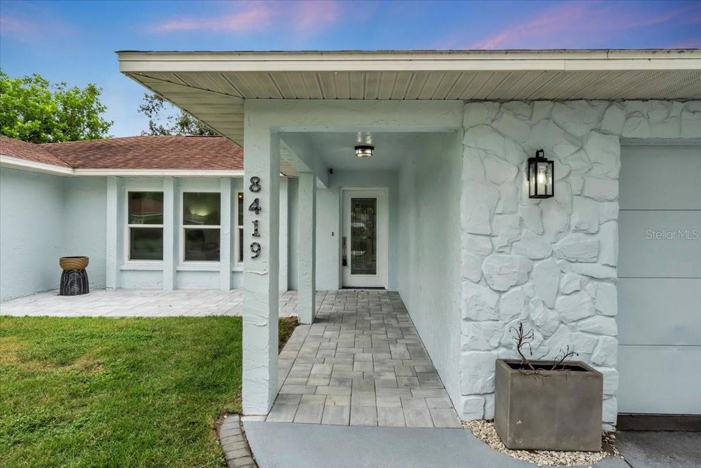 Photo of 8419 Sylvan Woods Drive, Sarasota, FL 34243 (MLS # A4668652)
