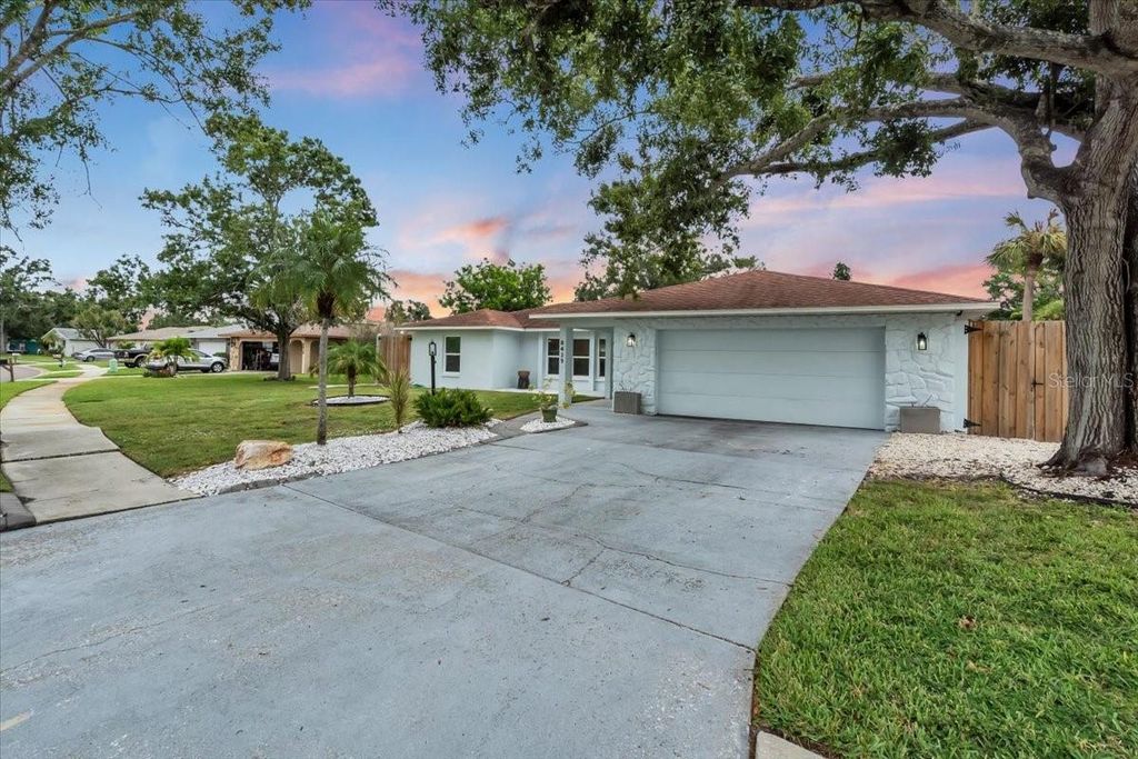 Photo of 8419 Sylvan Woods Drive, Sarasota, FL 34243 (MLS # A4668652)