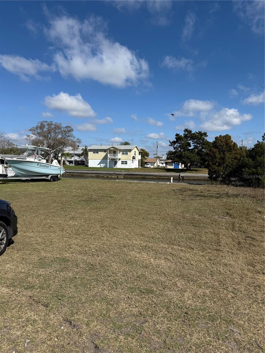 Consider building your next dream home in the desirable Hudson Beach Estates Waterfront Community in Florida. This charming neighborhood features canals created by the Army Corps of Engineers in the 1950s and 60s. Just a short boat ride away, you’ll find the open Gulf of Mexico, offering endless opportunities for fishing, sunbathing, scalloping, and enjoying stunning sunsets. A quick stroll around the corner brings you to a beautiful Gulf-front beach, park, and a selection of local restaurants and bars.
This spacious lot sits on a deep canal with 58 feet of seawall and extends 100 feet along the long side before reaching the cul-de-sac. You’ll also be conveniently located near hospitals, hotels, grocery stores, libraries, and popular attractions like Homosassa Springs, Weeki Wachee, and the world-renowned Clearwater Beach. Tampa International Airport is just under an hour away, making travel a breeze.
With no HOA or CDD fees, this property offers the freedom and flexibility you desire. Financing may also be assumable for qualified buyers with a substantial down payment.