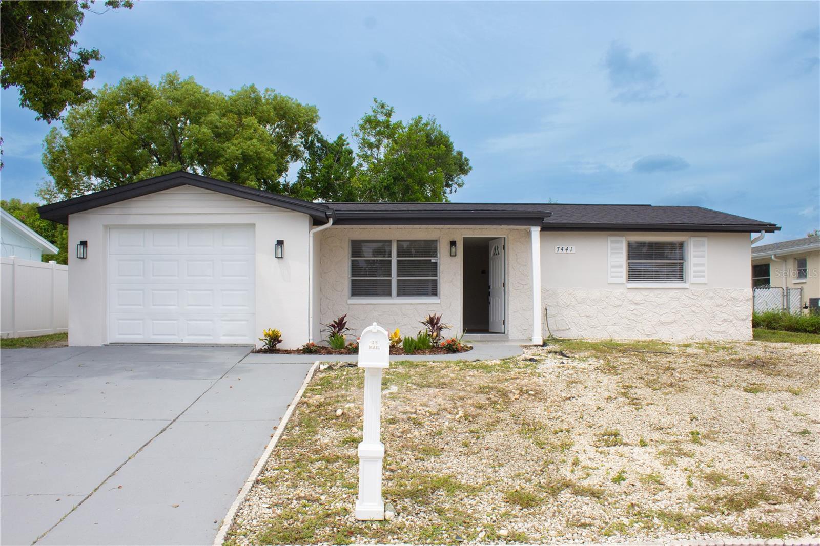 Move-In Ready & Fully Updated in Port Richey! Looking for a home that’s truly turnkey? This beautifully renovated 3 bedroom, 2 bathroom home has it all! Step inside and fall in love with the modern kitchen featuring brand-new cabinets, quartz countertops, and stainless steel appliances perfect for cooking and entertaining. Enjoy the fresh feel throughout with luxury vinyl flooring, totally updated bathrooms, and a spacious open layout ready for your personal touch. Major updates bring peace of mind too: brand NEW 2025 ROOF, 3 year-old AC, and new water heater. Relax or entertain in the large backyard patio, ideal for family gatherings or future outdoor projects. This home is the perfect blend of style, comfort, and long term value ready for its new owner to simply move in and enjoy! The best par of this NO HOA, NO CDD, NO FLOOD INSURANCE, 45 minutes away from Tampa and Clearwater, close to shopping stores and entertainment. 30 minutes away from the Greek boulevard in Tarpon Springs and Week Wachee River. Don’t miss your chance to own a fully upgraded home in Port Richey!