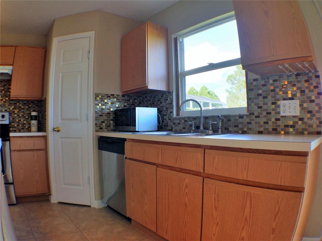 Photo of 4437 Stonemeadow Drive, Orlando, FL 32826 (MLS # O6393182)