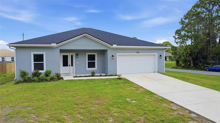Newly constructed 2.5-year-old residence situated in Palm Bay. This split-plan home features 4 bedrooms and 2 bathrooms, highlighting an open concept design. The kitchen/family room combination boasts vaulted ceilings, with laminate cabinets and stainless steel appliances including a stove, side by side refrigerator, dishwasher, range hood, and microwave. An island breakfast bar in the kitchen allows for interaction while preparing meals. The spacious living room also features vaulted ceilings, with ceiling fans in the master bedroom and living room for added comfort during warm summer days. The master bedroom includes a large walk-in closet and a master bath with his & her sinks. The guest bathroom offers a shower-tub combination. Positioned on a sizable corner lot, the backyard provides ample space for a fire pit, pets, and potentially a pool in the future. The home operates on septic and well systems, resulting in significant monthly savings. Additionally ,installed hurricane shutter screws are already installed and the shutters are neatly stored within the garage.

Conveniently located near shopping, including the new Walmart down the road, the residence is just minutes away from the charming Fred Poppe Park, where weekend activities are held regularly. Only 10 minutes from I-95 and 40 minutes from Melbourne Beach, this emerging neighborhood offers a promising future.

buyer to confirm sq ft.