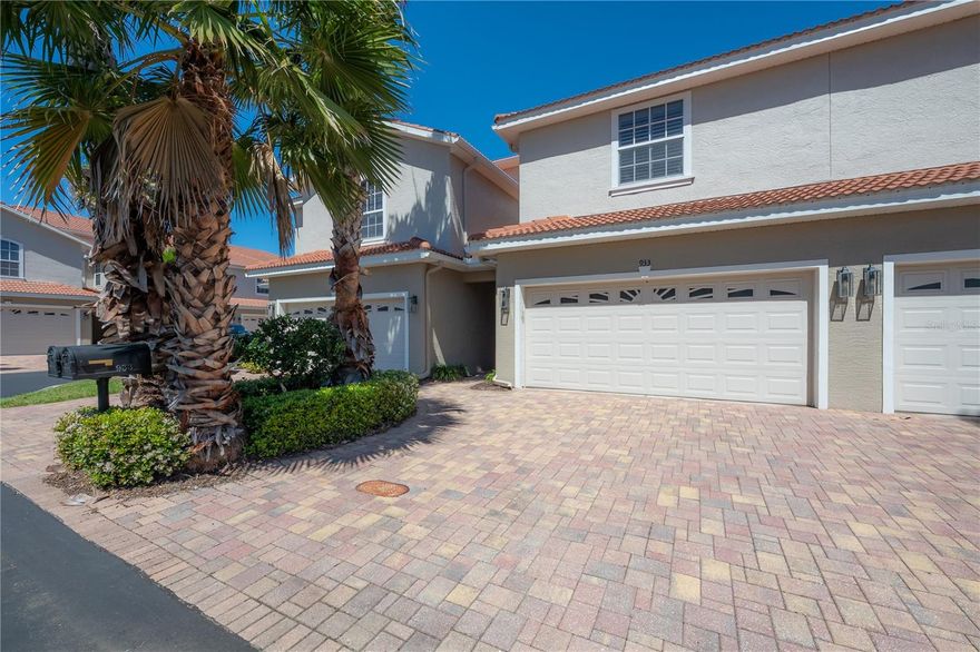 Renovated, comfortable, and welcoming townhome in a resort-style gated pool community in downtown historical Palm Harbor! Perfectly situated in the quiet heart of Villas of San Marino neighborhood and built in 2014 (newest construction phase), this 3-bedroom, 2.5-bath, 2-car garage, with bonus loft, covered-screened lanai and backyard acts as a wonderful escape while remaining close to convenience. Meticulously maintained, this home features over $80,000 in renovations completed in 2020. Upgrades include luxury vinyl flooring (driftwood finish) throughout both floors and staircase with edging, luxury padding placed under luxury vinyl for comfort, interior paint, new baseboards, crown molding, and Hunter Douglas plantation shutters on all windows and sliding doors, heavy duty storage overhead racks. The kitchen boasts granite countertops, a mosaic-tile backsplash, solid cherry wood 42-inch cabinets with crown molding, under-cabinet lighting, and a full suite of 2020 Frigidaire stainless steel appliances. Custom and handmade enhancements by Master Wood Craftsman include built-in entertainment centers, a loft bookshelf, an entry foyer coat and shoe bench station, a custom master closet system with shoe cabinet, and elegant wainscoting in the dining room.The laundry room is upgraded with a sink and cabinetry and the home features updated plumbing, lighting, and oil-rubbed bronze hardware. The spacious covered screened lanai opens to a private backyard retreat with potential for paving and hedging for added privacy. Additional highlights include a 2025 new garbage disposal, 2024 new exterior paint and new outdoor lighting, a 2014 tile roof, under-stair storage, a brick-paved driveway, and garage epoxy floors, heated community pool. Finally, the location is unbeatable since you are just steps from the famous Pinellas Trail that offers access to the shops and dining of historic downtown Palm Harbor (right across the community), Dunedin, Tarpon Springs, and Ozona. Enjoy nearby Pop Stansell Park, Honeymoon Island, and beautiful Gulf beaches with easy access for kayaking, boating, stand up paddle boarding, and moments of taking in the beauty of the Gulf with spectacular sunsets and sunrises. The Pinellas Trail also offers safe biking or walking to school with nearby top rated schools of Ozona Elementary and Palm Harbor University High School. With its thoughtful design and prime location, this home is ideal for relaxing and entertaining while enjoying the beautiful coastal breezes of historical Palm Harbor, Florida.