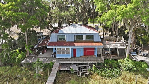 Photo of 400 Lakeshore Drive, Eustis, FL 32726 (MLS # G5112132)