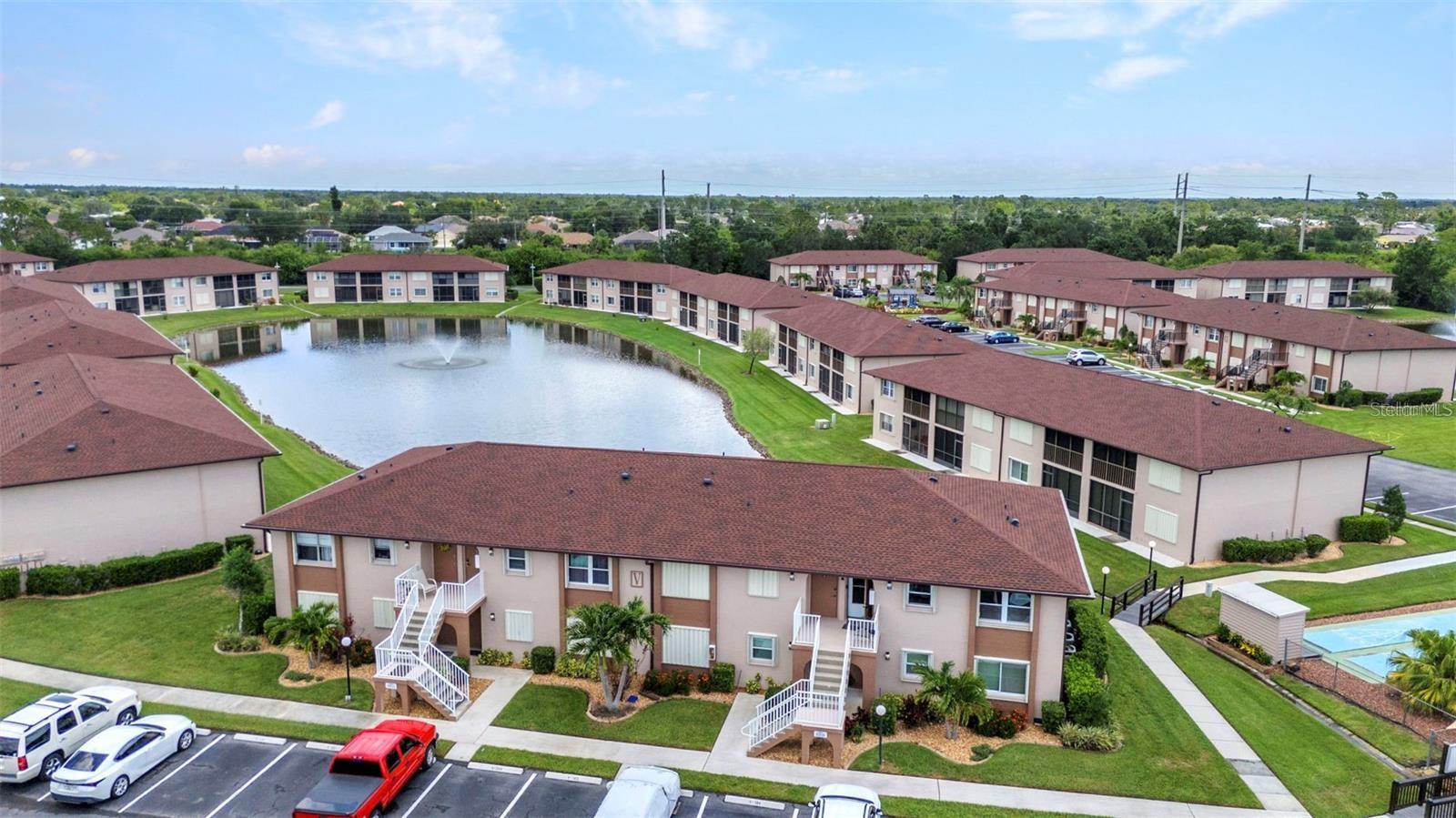 PRICED TO SELL!! MOTIVATED OWNER!! Don’t miss the LOWEST_PRICED unit in the highly sought-after Deep Creek Gardens community. This bright and inviting 2-bedroom, 2-bathroom second-floor condo offers 860 sq. ft. of living space with new flooring throughout and a functional open floor plan that makes the most of every square foot. The kitchen flows seamlessly into the dining and living areas, perfect for both relaxing evenings and casual entertaining. Step out onto your screened-in balcony and enjoy serene pond views year-round. Additional perks include in-unit laundry, low HOA dues, and the peace of mind of being in Flood Zone X.
Deep Creek Gardens residents enjoy an array of amenities including a sparkling community pool, tennis and pickleball courts, shuffleboard, clubhouse, and grilling/picnic areas—perfect for embracing the Florida lifestyle. Conveniently located right next to I-75 and just minutes from shopping, restaurants, and renowned golf courses, this condo offers both comfort and unbeatable convenience. At this price, it won’t last long.
