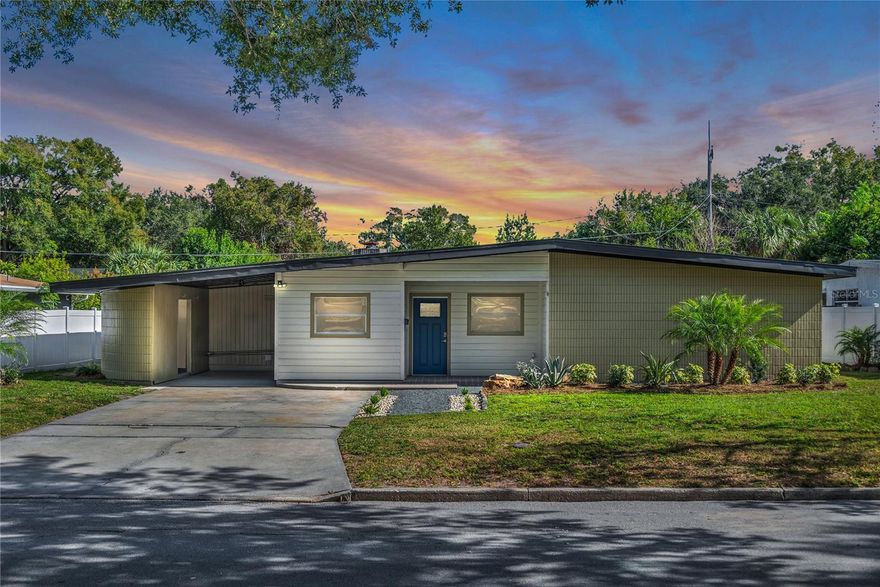 Step into a classic mid-century-modern vibe with this beautifully restored ranch home,
located in the popular Dover Shores neighborhood. This 4-bedroom, 3-bath gem, built in
1958, blends a bright & airy design with modern-day updates, creating a home that’s as
functional as it is stylish.  From the moment you walk through the front door, you will be smitten with the circular sunken
living room, thoughtfully restored to preserve its iconic design. The open-concept layout
and oversized windows allow natural light to drench the restored terrazzo flooring and
sleek modern finishes. At the heart of the home, the totally updated kitchen mirrors the
circular design of the living room. It features brand-new shaker cabinets, new stainless
steel appliances, new stone countertops, and an oversized walk-in pantry with plenty of
room to accommodate your morning coffee bar.  The home features a split floor plan, providing privacy and versatility, with spacious
bedrooms and updated bathrooms. The ensuite master bedroom boasts a huge
bathroom that has been totally renovated, large double sinks, new stone countertops, and a large walk-in shower. The laundry room is just
outside the master, in addition to a cozy nook with a wood-burning fireplace, perfect for reading and relaxing.
Outside, the newly landscaped yard and wooden deck offer plenty of possibilities for
quiet relaxation, entertaining and cookouts. Enjoy easy, maintenance-free living with
practical upgrades like a new AC system, new water heater, and a newer roof (2019).
The entire house, inside and out, has been freshly painted, ensuring that this home is
move-in ready,
The location of this home is just minutes from highways and Dover Shores' vibrant
shops, trendy restaurants, and all the conveniences the neighborhood has to offer.
Don’t miss the opportunity to own a piece of mid-century modern history, thoughtfully
updated for today’s living. Call today for your private showing and Love Where You
Live!