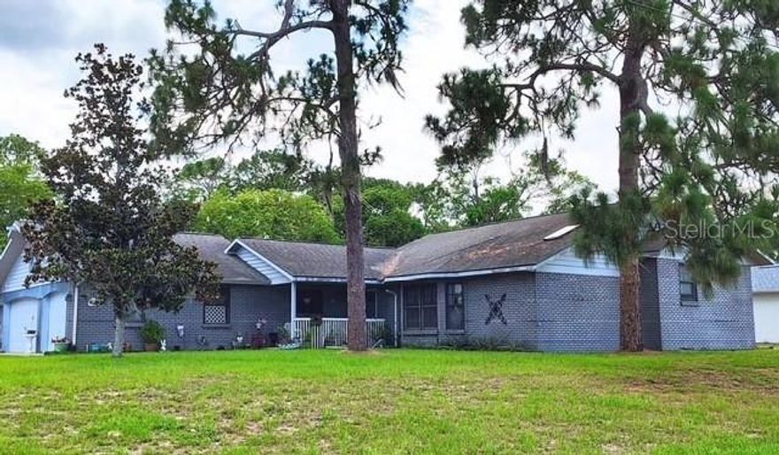 Three bedroom, two bath, 3 car garage, pool.