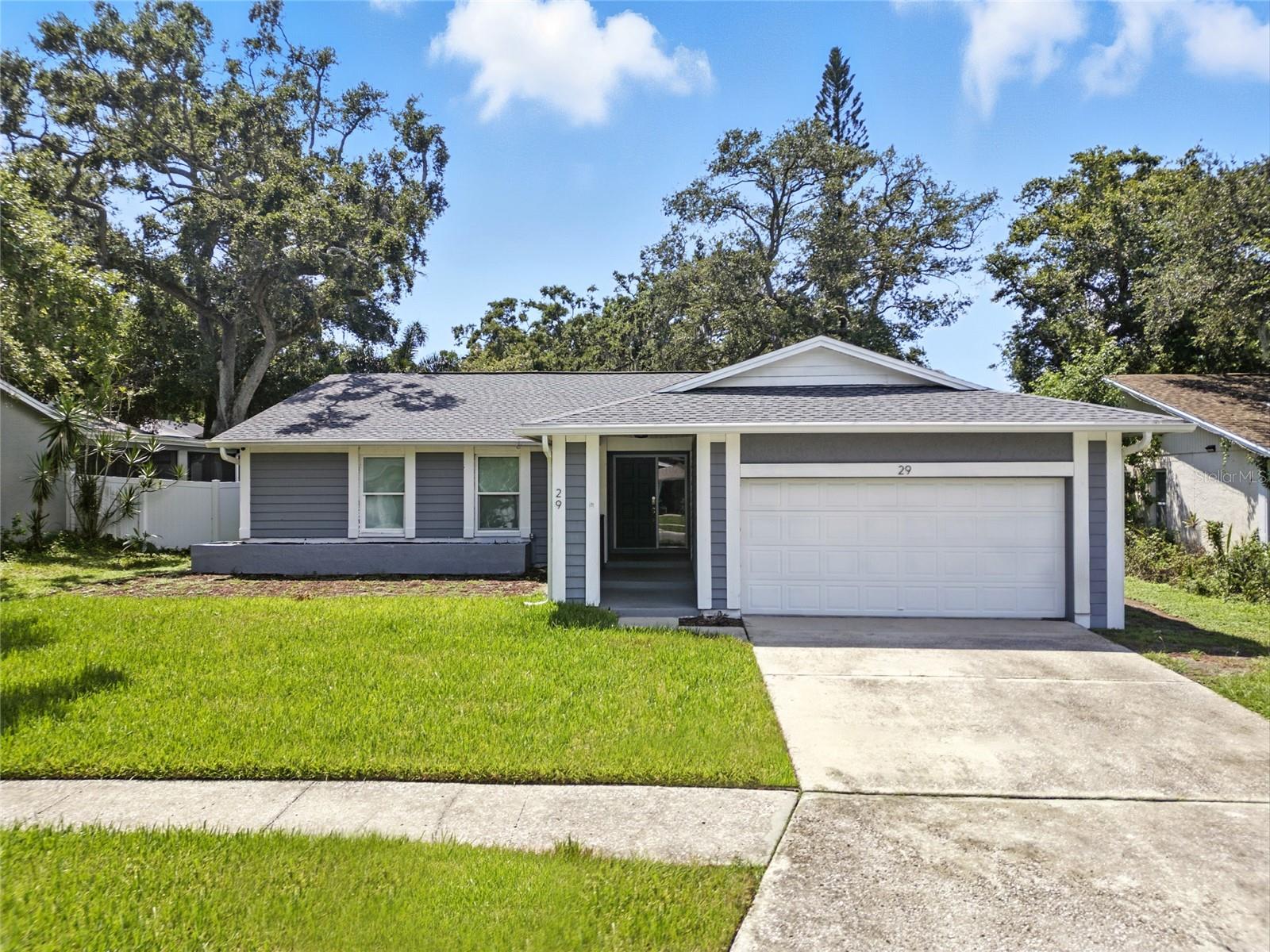 Welcome to Harbor Oak Estates, a peaceful, tree lined neighborhood in Safety Harbor. This beautifully updated residence invites you into an open, light-filled floor plan designed for both comfort and sophistication. The updated kitchen is a true showpiece, featuring a spacious island, custom cabinetry, and generous storage — perfect for entertaining in style.
Step outside to your screened-in porch, an ideal retreat for morning coffee or evening cocktails, surrounded by the serenity of your private outdoor space. Thoughtful upgrades include designer custom blinds throughout, ensuring both beauty and function.
Situated just moments from the charm of downtown Safety Harbor, you’ll enjoy boutique shopping, rejuvenating spas, and acclaimed local dining at your doorstep. With a new AC system (2025), new roof (2021), and a new electric panel, this home seamlessly blends timeless luxury with modern peace of mind.