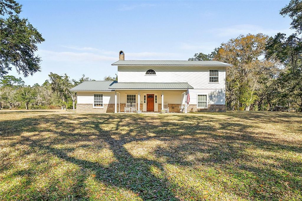 Photo of 998 County Road 302, Bunnell, FL 32110 (MLS # FC315840)