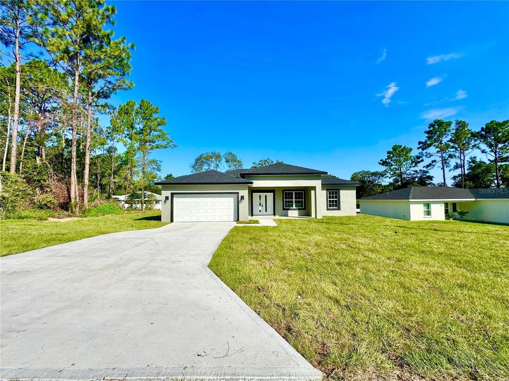 Photo of 8010 N Pocono Drive, Citrus Springs, FL 34434 (MLS # O6333430)