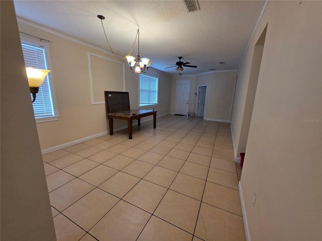 Photo of 830 Neptune Pointe Lane, Kissimmee, FL 34744 (MLS # O6371003)