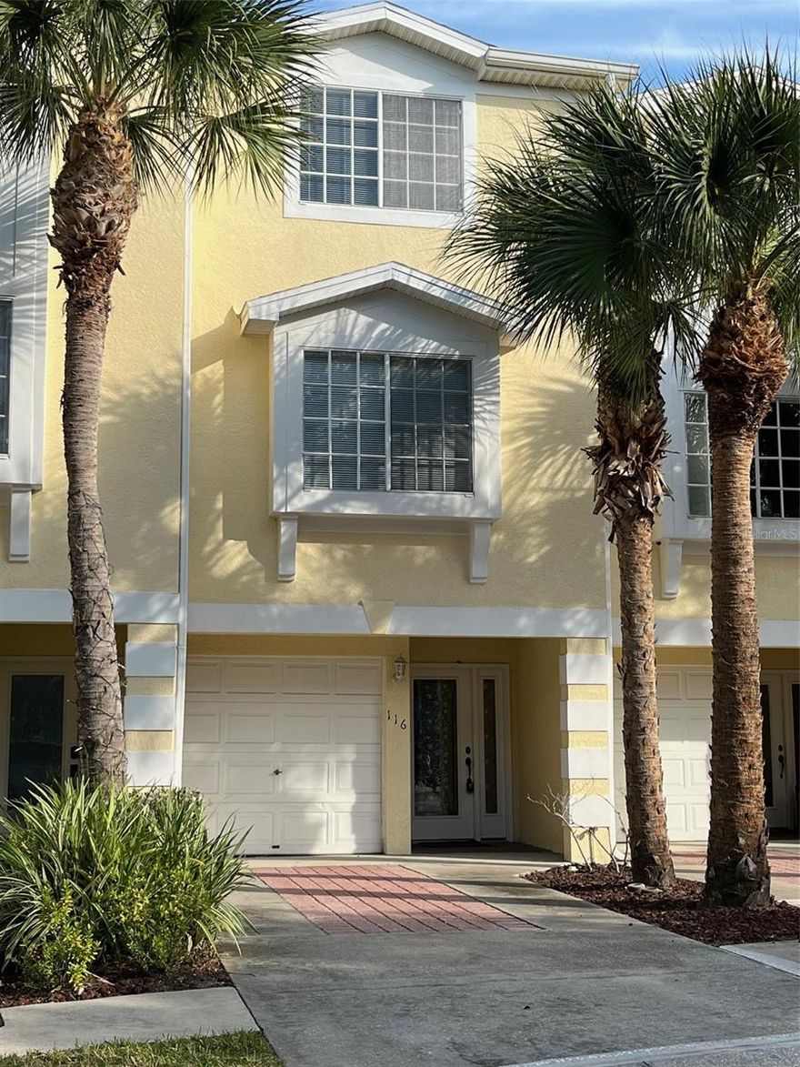 Elevated Gated Community. WATERFRONT 3 bedrooms, 3 full baths plus a tandem 2-3 car garage with sliders to a first, second and third floor patios, the patios overlook the dock and boat slip that come with the townhome. The kitchen is open to the dining and family rooms. One bedroom and full bath is located on the main level, while the master suite, and the 3rd bedroom both with full bathrooms are located on the top floor along with the laundry closet. The oversized master features two walk-in closets and floor to ceiling windows with sliders out to one of two private balconies in the home. The master bath has a walk-in shower, garden tub, and dual sinks. High ceilings throughout the home.  A must see!  Seller is motivated!  LET'S MAKE A DEAL!