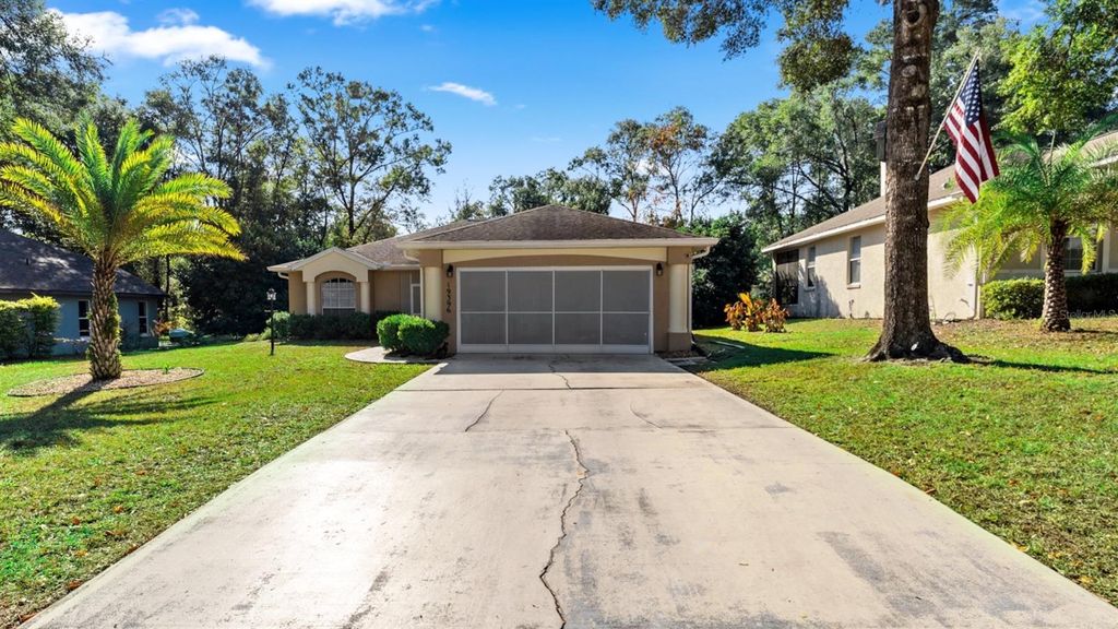 Photo of 19396 SW 100th Loop, Dunnellon, FL 34432 (MLS # OM715330)