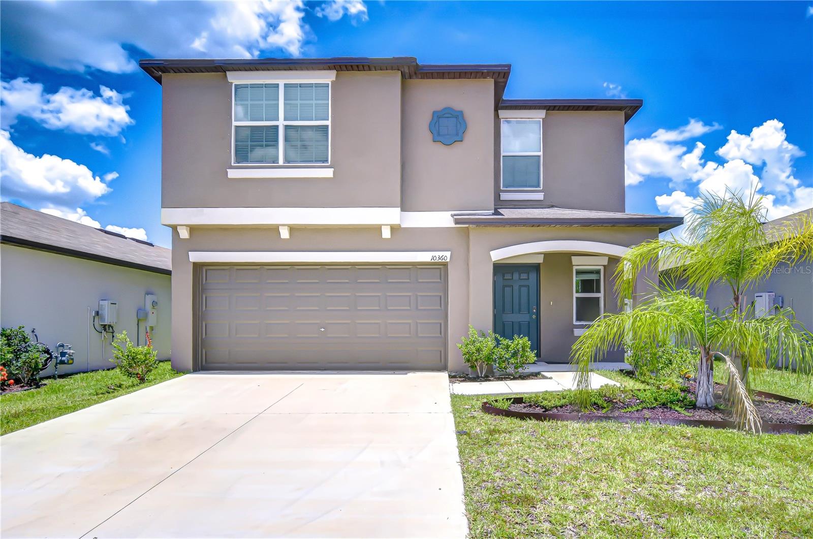 Welcome to your next chapter in style—this nearly-new 2022-built gem in Riverview’s sought-after South Creek community has everything you’ve been dreaming of and more! Boasting over 2,200 sq ft, this 5-bedroom, 2.5-bath home is move-in ready and thoughtfully designed for everyday living and entertaining alike. Downstairs, an open-concept layout welcomes you with sleek tile floors, a bright and inviting living space, and a stunning kitchen featuring granite countertops, stainless steel appliances (including a gas range), a large center island with a breakfast bar, ample cabinetry, and a walk-in pantry. A convenient half bath completes the main floor. Upstairs, enjoy the flexibility of a spacious loft—perfect as a second living area, media room, or play space. The oversized primary suite offers a peaceful retreat with a walk-in closet and en-suite bath featuring a dual sink vanity and walk-in shower. Four additional bedrooms provide generous space for family, guests, or a home office setup, and share a full bath with dual sinks. Outside, the fully fenced backyard is a blank canvas ready for your dream outdoor oasis—add a pool, build a patio, or create your ideal garden retreat. Bonus: the home comes equipped with an energy-efficient tankless water heater! South Creek’s new community pool and clubhouse are now open and ready for summer fun. Plus, you'll love the location—just minutes from top-rated schools, shops, dining, and with easy access to I-75, US-301, and US-41. Whether you’re commuting to Tampa or heading out to the Gulf Coast beaches, adventure is always within reach. Copy and paste this link to tour the home virtually: my.matterport.com/show/?m=GFao2ABW3h6&mls=1