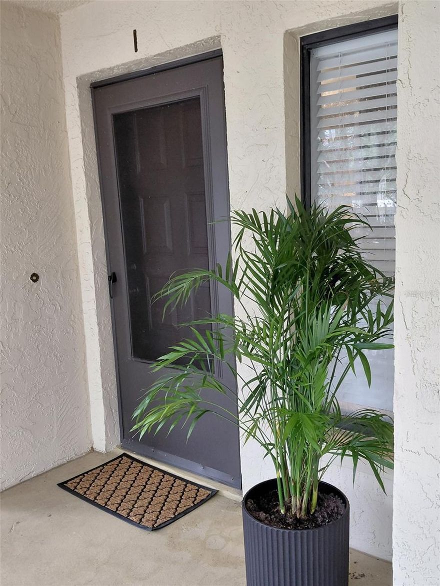Rare location for sale in Countryside North!  This 1 bedroom, 1 1/2 bath condo on the second floor is in a tranquil wooded neighborhood.  Includes indoor/outdoor patio which can be used as an extra bedroom.  Washer and Dryer (included) are located on side hallway.  You will enjoy the community pool and adjacent, safe walking path.  Includes covered designated parking.  Equipped with over-capacity air conditioning.