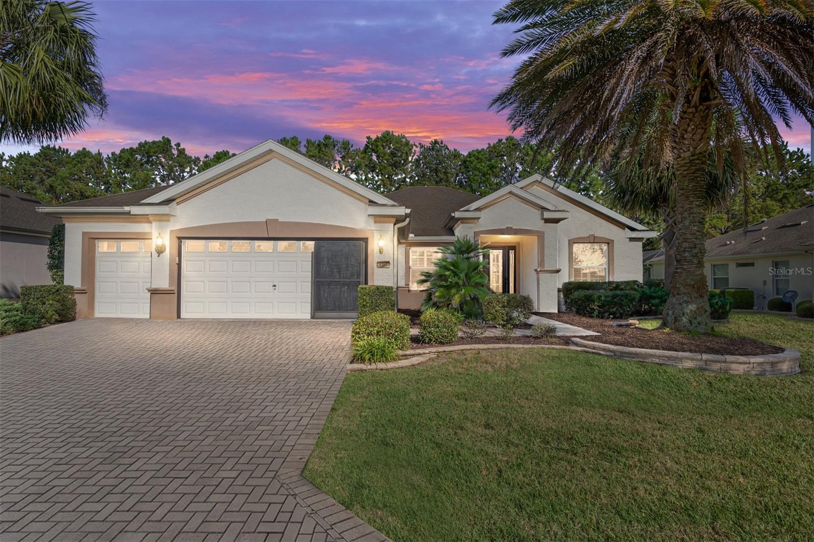 Short- or Long-Term Hanover floor plan rental available! The Stone Creek resort style community for Seniors of 55+ offers many amenities. Enjoy golf courses and golf cart trails, tennis, pickleball, basketball courts, fitness center, game rooms, outdoor and indoor swimming pools (two heated Olympic-size swimming pools), two jacuzzi and a Turkish steam room. Year-round social events and activities. 3/2/3 with many upgrades. Open floor plan with a large primary bedroom and ensuite bath with dual sinks and walk in closet plus 2 additional bedrooms and another bath. Custom wood floors, plantation shutters, crown molding, window treatments, chandeliers, dimmer switches and ceiling fans make this home comfortable and inviting. Kitchen has raised panel cherry cabinets, under cabinet lighting, granite countertops, eat up kitchen bar, new stainless-steel appliances and upgraded fixtures, solar tubes, plus extra counter space and cabinets. Laundry room is complete with washer, dryer and utility sink. The enclosed lanai with tiled floors overlooks a patio and backyard enclosed by trees and shrubs for complete privacy. The 3-car, extended length garage has room for 2 large vehicles and a golf cart, space for hobbies and storage. The home features beautiful landscaping. Convenient location to everything: shopping, restaurants, medical, nature and parks, and the World Equestrian Center of Ocala, arts and theater. Nearby Attractions include the Silver Springs State Park with glass-bottom boat tours, Silver Glen Springs & Juniper Springs, Salt Springs, Sholom Park with a Japanese Zen Garden plus many other nature parks. Santos Trails with paved bike trails, Historic downtown Ocala & Appleton Museum of Art and Civic Theater. For easy travel you can access major airports and ports from Ocala. Ocala International Airport (about 7 mi.), Orlando International Airport (about 90 mi.), Tampa International Airport (about 100 mi.), Miami Airport (about 300 mi.) and Gainesville Regional Airport. 24-hour guard gate. Pets okay but must be individually approved. All utilities included with price of monthly rent. Unfurnished. No Smoking. Minimum 6 Months lease. Pets with approval.