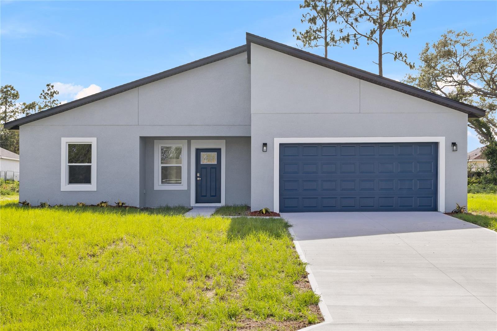 Brand new 4-bedroom, 2-bathroom home in beautiful Ocala! This modern new construction offers an open-concept layout with spacious living areas and stylish finishes throughout. The kitchen features sleek stainless steel appliances, perfect for everyday cooking and entertaining. Enjoy the convenience of a dedicated laundry room and a 2-car garage for ample storage. With plenty of natural light and thoughtful design, this home combines comfort and functionality—ideal for families or anyone looking for a fresh start in a growing community.