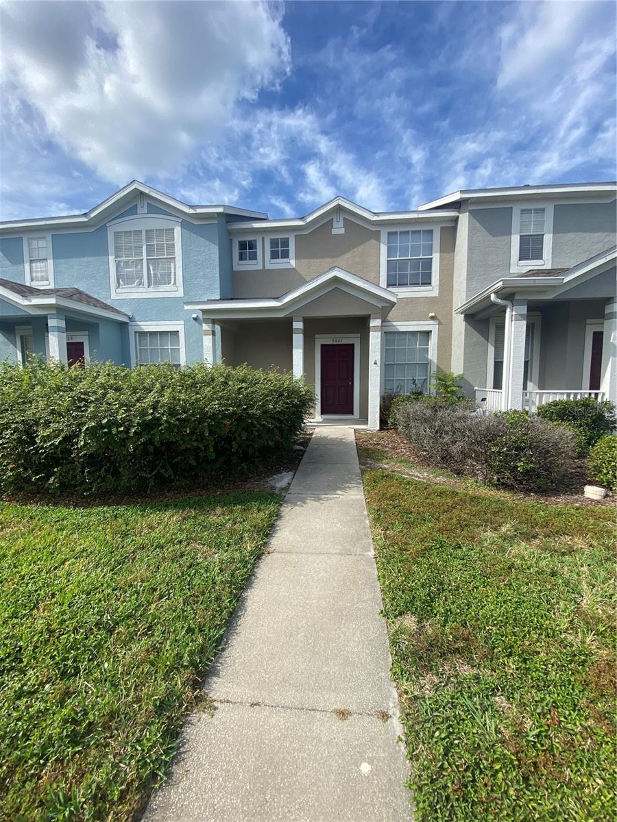 Discover this beautifully maintained 2-bedroom, 2.5-bath townhome in the gated community of Santa Fe at Stagecoach Village in Land O’ Lakes. This home features hard-surface flooring throughout—no carpet—for easy upkeep and a fresh, modern feel. The main floor offers a full kitchen, open living area, half bath, and an in-unit laundry closet. Step out to the screened, covered lanai—ideal for quiet mornings or evening unwinding. Upstairs, you'll find two spacious bedrooms, each with its own bathroom for added privacy and comfort. Enjoy the peace of a gated neighborhood while staying close to major highways, shopping, and dining. This townhome is move-in ready and waiting for you—schedule a showing today!