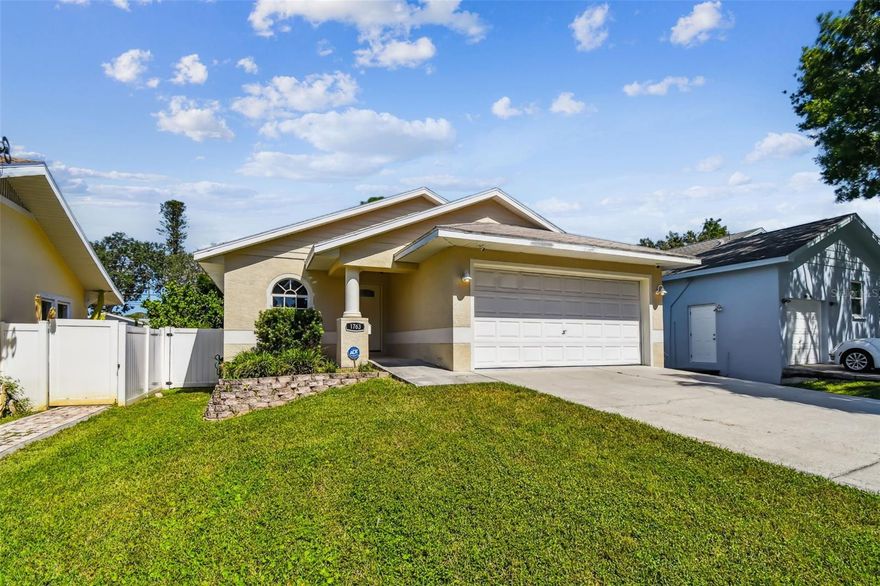 BUILT IN 2003 ON ELEVATED GROUND, this beautifully renovated 3-bedroom, 2-bathroom move in ready block home in St. Petersburg is a true gem. Step inside to discover a bright, airy sanctuary featuring High Ceilings and an Open-Concept design that's full of natural light. The fully updated kitchen in 2025 is a showstopper boasting brand-new Stainless Steel Appliances, Solid Wood Cabinetry with matte black fixtures, and luxurious Granite Countertops. Both bathrooms have been tastefully modernized with Solid Wood Vanities, matte black fixtures, and Stone Counter Tops blending style and function seamlessly. Enjoy peace of mind with major upgrades, including new waterproof flooring in all three bedrooms (2025), a new A/C system (2023), a new hot Water Heater (2022), and a Whole-House Water Filtration/Water Softener system (2022). Outside, a spacious, beautifully landscaped Vinyl Fenced backyard offers the perfect setting for barbecues, entertaining, or unwinding in your private oasis. This location is centrally located and very close to Vibrant Downtown St Petersburg where you will find many top rated Restaurants, Museums, and Social Events taking place almost every weekend! Enjoy the many neighborhood activities including Holiday Golf Cart Parades, or just a short drive through Snell Isle to the bustling Vinoy Park. Don't miss your opportunity to own this thoughtfully designed home that is also conveniently located just minutes from Publix, Whole Foods, parks, and the NEW neighborhood RECREATION Center featuring pickleball, basketball, a large POOL, waterslides, fitness, and a lot more, is right down the street!