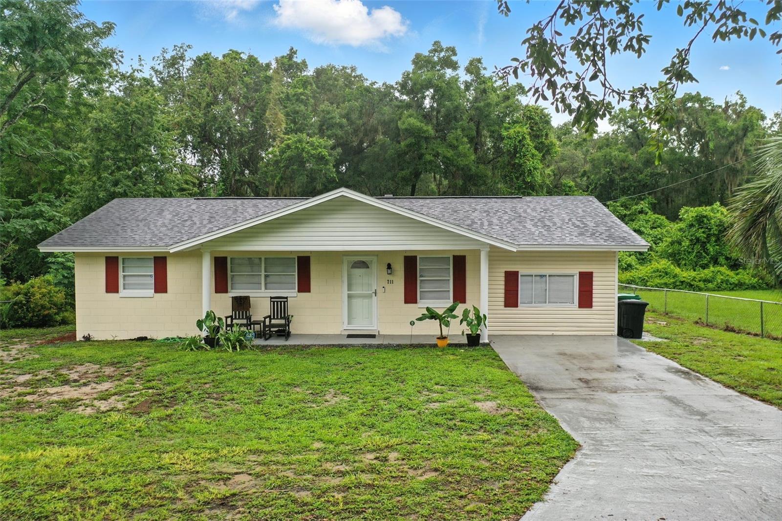 Seller Motivated and offering $10,000 towards buyers closings costs!! Step into this beautifully updated home offering generous living space an added 5th bedroom, and all the upgrades you need not to mention No HOA. Inside, you'll find stylish NEW laminate flooring, modern lighting that enhances the warm atmosphere, and a freshly REPLACED ROOF for peace of mind. 2024 updated AC and Hot Water heater! The contemporary kitchen showcases sleek quartz countertops, brand NEW cabinetry and stainless steel appliances ready for your culinary creations. Bathrooms have been redesigned with a tasteful eye for both form and function. Enjoy time outdoors on the screened and covered back patio, providing the perfect spot to relax in comfort while overlooking the spacious backyard that's great for gatherings or play. Blinds throughout add a touch of privacy and convenience. This move-in-ready home is waiting for you, come see it today and experience all it has to offer!
