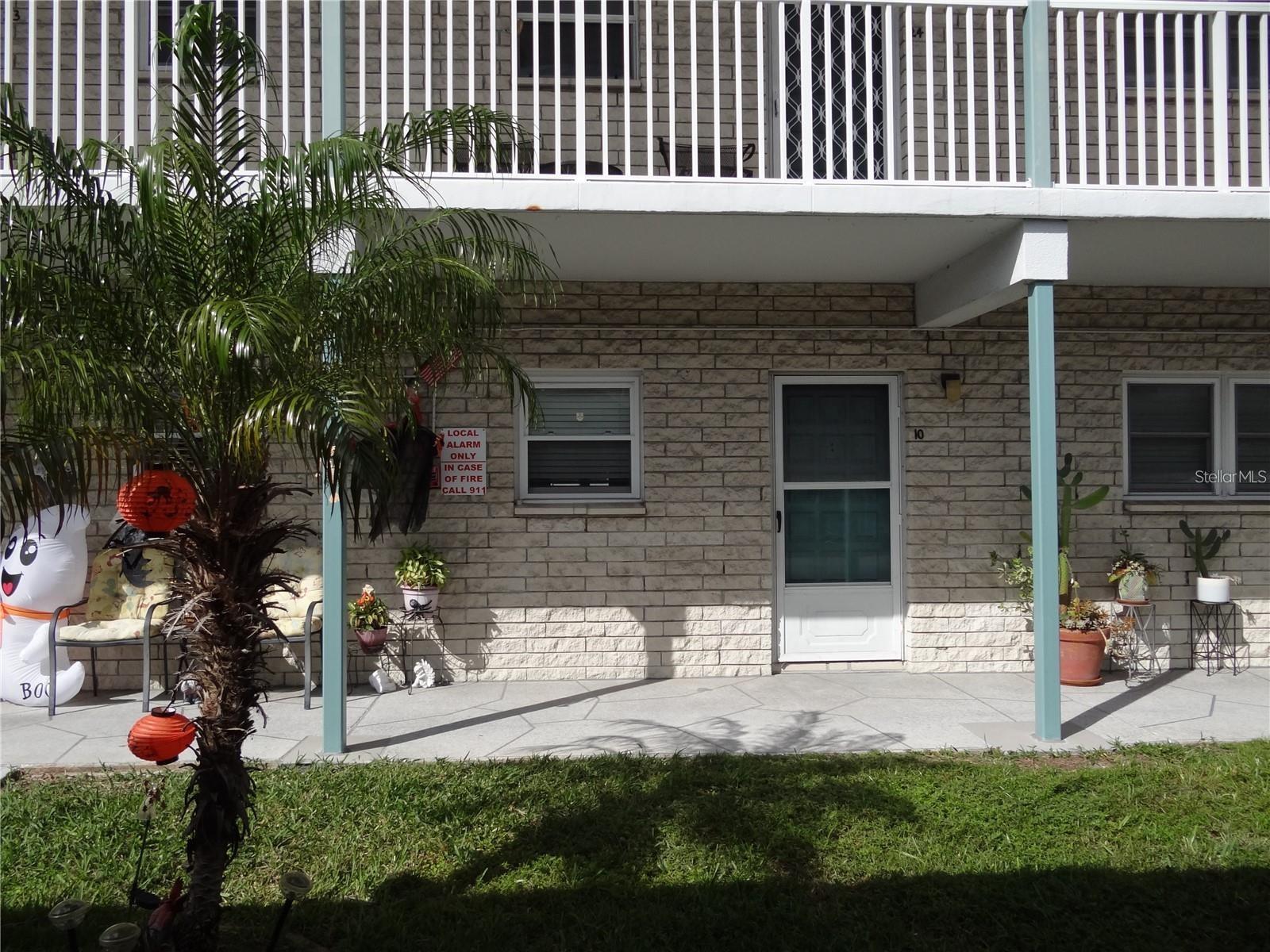 Discover the charm of this spacious first-floor 1-bedroom, 1-bath condo located in the vibrant 55+ community of Paradise Shores. Enjoy the convenience of covered, assigned parking just steps from your front door, along with plenty of guest parking nearby. Inside, the unit features an open great room layout with a combined living and dining area, a bright and functional kitchen with newer appliances, generous pantry space, and updated lighting. The building exterior has been recently renovated, including a newer roof and refreshed porches. Community amenities include a sparkling updated pool, shuffleboard courts, a tiki-style BBQ area with plenty of seating, and a lively clubhouse offering regular activities and events. Just minutes from the beaches, shopping, dining, and with easy access to major roads and airports—this is Florida living at its best. Paradise Shores is a 55+ community.
