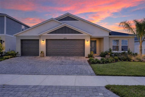 Photo of 31710 Chateau Manor Ln, Wesley Chapel, FL 33545 (MLS # TB8559052)