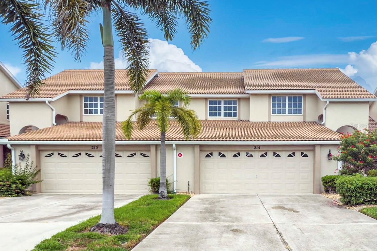 Welcome to your Dream Townhome at 3800 Bal Harbor, Punta Gorda FL. This Turn-Key, impeccably maintained 2068 Sq Ft wonder boasts of 3 spacious bedrooms and 2.5 bathrooms, exuding a bright, airy, coastal charm. AND…An unbeatable location seals the deal…only minutes away from Fishermen’s Village and historic downtown Punta Gorda, known for its delightful restaurants and boutique shops. Water enthusiasts rejoice! – The townhome comes with a deeded dock/water&electric directly behind the home, providing sailboat (deep water/no bridges) access to Charlotte Harbor. A boat lift may be added with the approval of the condo association.
Life gets a beautiful upgrade here. The Great Room impresses with a soaring two story ceiling and a large transom window allowing a bright and airy feeling.The primary bedroom nestles cozily on the first floor while extensive recent updates lend an air of modernity. The generous guest bedrooms share a fully updated bath on the second floor. The kitchen is a show-stopper with gleaming granite countertops and high-end stainless steel appliances that are a joy for cooking enthusiasts. Two dining areas complete the first floor….ideal for casual dining or entertaining a large group of friends…One currently set up as a bar area. This floor plan also features a dedicated loft area…the perfect space for setting up your home office or personal gym. This property is an organization lover's dream with a huge amount of storage space and an extra-large laundry room with additional storage as well. Another distinctive feature of this property is its oversized two-car garage – a feature seldom found in townhomes.
Owning this home is more than a purchase – it's a lifestyle. While gently used, it's been treated with incredible care and is ready to welcome its new owners. The motivated seller eagerly looks forward to passing the keys to this piece of paradise.
Don't miss out on the chance to call this exclusive property your own. Schedule a showing today or reach out to us for more information. All dimensions and specifications are deemed to be accurate and should be verified by the buyer or buyer's agent's satisfaction. Some personal items are excluded please see exclusion list attached.