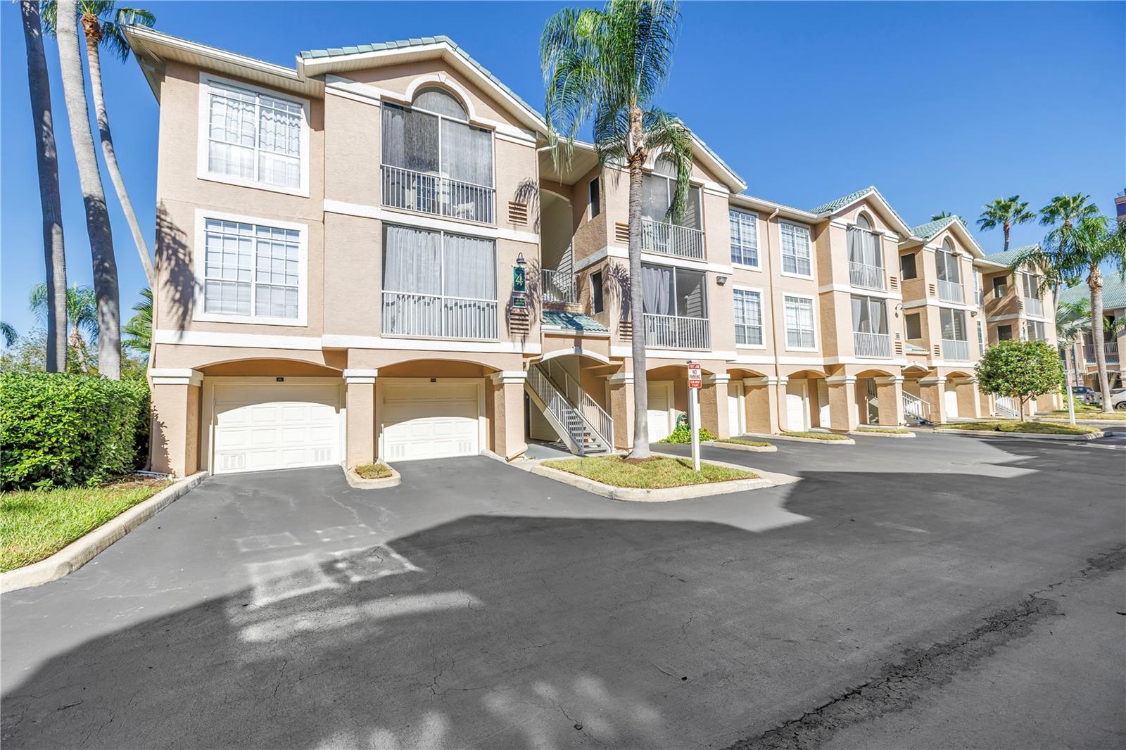 Absolutely stunning move-in ready 1-bedroom, 1-bath condo with an attached oversized 1-car garage in highly sought after Island Club at Rocky Point. Enjoy resort-style living in this condo that has abundant natural light and an open floor plan. Upon entering, you will immediately notice the handsome luxury vinyl flooring. The living room has crown molding, gorgeous plantation shutters, built-in shelving and a glass door that opens to the screened balcony. The gourmet kitchen has newer custom white cabinets, granite counters and stainless-steel appliances. The indoor laundry room with newer washer and dryer is off the kitchen. The bathroom has been updated with a new cabinet with a granite counter, ceramic tile flooring and a mirror. The bedroom has plantation shutters, built-in shelving and a walk-in closet with custom-built ins. The unit has an attached oversized 1-car garage with a private staircase going directly into the condo. Updates include an AC unit that was replaced in 2019, washer and dryer in 2022 and refrigerator, microwave, range and dishwasher in 2021. Island Club at Rocky Point has fabulous amenities including a fitness center, waterfront pool, spa, sauna, grills, clubhouse and a 200-foot pier. The monthly HOA covers cable TV, internet, trash, flood insurance, exterior maintenance, pest control and onsite property management. The community is convenient to restaurants, upscale shopping, beaches, TIA and the Westshore business district t. Island Club at Rocky Point is not only a place to call home…It’s a lifestyle.