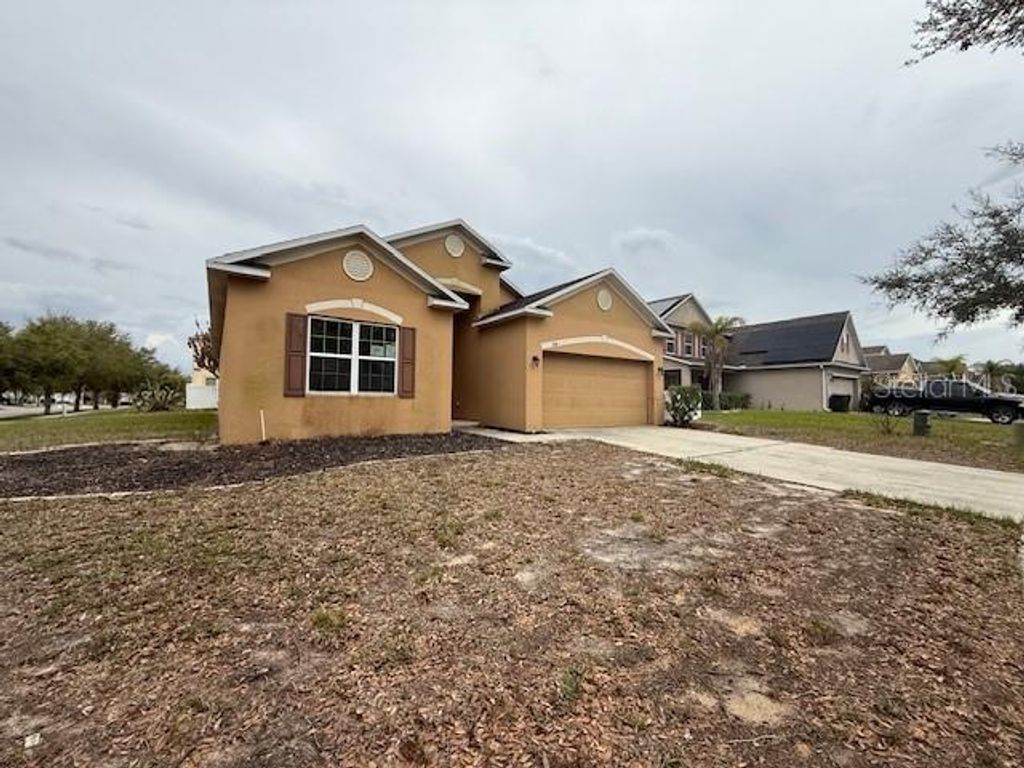 Photo of 330 Gladesdale Street, Haines City, FL 33844 (MLS # S5145936)