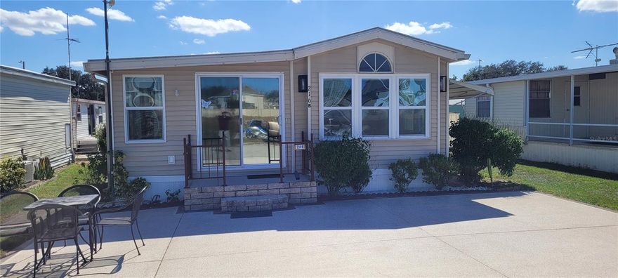 Hillcrest Mobile Home Park is an active 55-plus community that includes a clubhouse, pool, fitness, game room, and billiards.  This property has newer floors, paint, light fixtures, toilets, a Murphy bed, a couch, and end tables.  The kitchen has newer solid wood cabinets, gas stove, microwave, side by side refrigerator/freezer with water & ice in the door, plus a table and chairs.  Newer Central A/C and many other things.  A full list is in attachments or available upon request. The property is fully furnished. This property has a land lease. Please confirm lot rent with Hillcrest Mobile Home Park.  Buyer is responsible for confirming information.