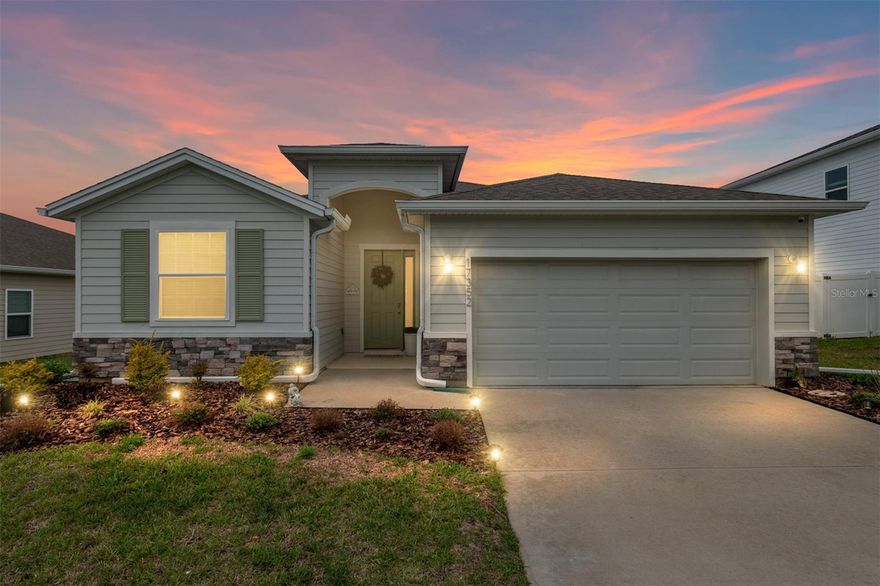 Welcome to better-than-new living in the highly desirable Briarwood community! This stunning DR Horton Lantana model offers 4 bedrooms and 2.5 bathrooms, combining the feel of a brand-new home with a long list of upgrades and thoughtful enhancements you simply won’t find in the builder’s standard inventory.

Lovingly maintained and meticulously improved by its current owners, this home is truly move-in ready. Step inside to a spacious, light-filled interior featuring contemporary finishes, upgraded interior light fixtures, custom blinds, and added shelving for enhanced functionality. The expansive kitchen is a true centerpiece—perfect for both everyday living and entertaining—complete with a stylish tiled backsplash and a full suite of upgraded appliances, including a sleek French door Samsung Smart refrigerator, plus washer and dryer.

This home stands out with numerous upgrades beyond new construction, including ceiling fans with lighting, enhanced exterior lighting, rain gutters, and a full landscaping package. Situated on a premium high and dry lot with excellent drainage, the property also offers a beautiful backyard view that adds to its overall appeal.

Enjoy Florida living at its finest with a large screened-in lanai and elegant French doors that open to an extended outdoor space featuring a 270 sq ft paver patio and walkway. The backyard is truly special—designed as a private retreat with two raised garden beds and carefully planned landscaping to remain attractive and mud-free year-round.

For added peace of mind, the home is equipped with an ADT security system, including a front doorbell camera, two exterior cameras, interior camera, and garage monitoring, along with a convenient garage door opener.  This home also features full SMART home integration, with all interior switches upgraded to smart controls—allowing you to program and manage lighting, temperature, and smoke detection from anywhere using the ADT/Alarm.com mobile app.

Ideally located between Alachua and High Springs with quick access to I-75, this home places you just minutes from shopping, dining, and everyday conveniences. Outdoor enthusiasts will appreciate the close proximity to some of North Florida’s most beautiful natural springs, perfect for weekend getaways.

Why wait to build when you can own a fully upgraded, turnkey home today? This exceptional property offers more value, more features, and immediate availability—making it a rare opportunity in Briarwood. The seller is motivated, so don’t miss your chance to make this incredible home yours—schedule your private showing today!