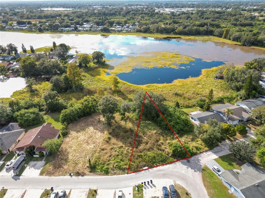 This .24-acre parcel provides the perfect balance of space and community. At roughly a quarter-acre, it gives room to design your ideal outdoor retreat while still enjoying the welcoming neighborhood feel.

The location gives you access to the many conveniences of Lakeland living — nearby shopping, dining, schools, and parks all make day-to-day life easy and enjoyable. Whether you’re looking to build a private lakeside haven, a weekend getaway, or a full-time residence, this lot gives the flexibility to create your own space while being part of a friendly and established community.

With its combination of water access, lakefront scenery, and a neighborhood that feels spacious yet connected, this property invites you to envision a lifestyle filled with comfort, relaxation, and possibility.

Seize the opportunity to design your own lakeside retreat — schedule a visit today and see the potential for yourself.