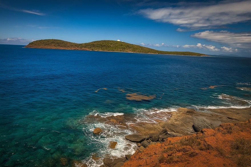 Discover your slice of paradise in Culebra, Puerto Rico! This expansive 14.075 cuerdas (13.67 acres) of undeveloped land offers breathtaking, unobstructed ocean views, perfect for building your dream getaway. Located in the peaceful Barrio San Isidro, you’ll enjoy the serene beauty and tranquility of Culebra, a charming island known for its pristine beaches and laid-back vibe. With approximately 1,000 linear feet of water frontage, the ocean is quite literally at your doorstep, making this idyllic lot the perfect canvas to create your own private paradise.