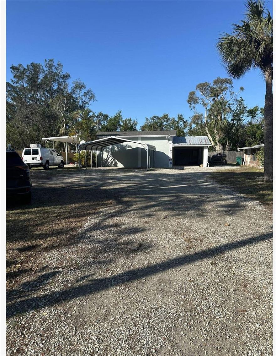 Discover a prime investment opportunity with three adjacent lots measuring 181 X 150 feet. Lot 18 & 19 features 2 commercial buildings, perfect for various business ventures with a current zoning of E2. Lot 17 is a cleared and buildable parcel, offering flexibility for future development. This unique property combination caters to diverse needs, making it an attractive proposition for investors and developers alike.  The property is conveniently located with easy on/off access to Gandy Blvd. A Large lot that can accomodate larger equipment along with 2 car ports and an overhead garage door off to the side

Zoned E-2 typically indicates a specific designation that allows for certain types of commercial and residential uses. This zoning may permit a mix of uses, such as retail, service, office, or residential development, depending on local regulations. It’s important to review the detailed zoning code for E-2 in your area to understand the exact permitted uses, density requirements, and any restrictions that may apply to your properties.