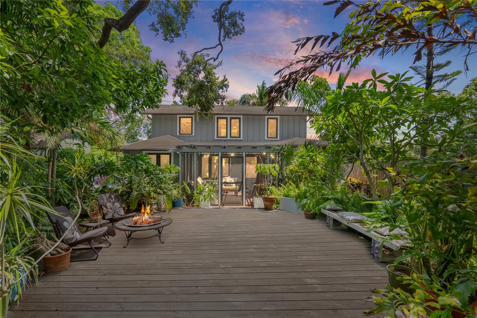 NON-FLOOD zone location…Paradise awaits you in his charming 2-story, 3-bedroom, 2-full baths, and 3 parking spaces in front. Your own private and lush tropical front yard where you'll find a deck for entertaining and relaxing amongst avocado, papaya, and Live Oaks in the Old Northeast neighborhood. The property is fully enclosed with private fencing, ensuring both security and seclusion. The yard is perfect for entertaining and relaxation, featuring a Jacuzzi for unwinding under the stars. Thoughtfully placed lights in the trees cast a warm, inviting glow, enhancing the ambiance. Front of the property, you’ll find a spacious deck with a huge shed—ideal as a dedicated workout area, art studio, or creative retreat tailored to your lifestyle. The large screened-in front porch offers a comfortable extension of your living space, perfect for savoring gentle Florida breezes. Step inside through an elegant Anderson door and discover this charming 1920s beauty, where timeless character meets modern durability. HURRICANE-IMPACT windows fill the home with natural light, while upgraded spray foam INSULATION and reinforced ROOF STRAPS offer year-round comfort and peace of mind. The eclectic first floor features an open eat-in kitchen and living room, ideal for family interactions and entertaining. A cozy family room and primary bedroom and bathroom, complete with a hallway of closets and a convenient laundry area, complete the thoughtfully designed first floor. Upstairs, discover two inviting bedrooms flanking a versatile living space, perfect for a playroom, home office, or library. The upstairs bathroom showcases an original freestanding tub and a separate shower, adding a touch of vintage elegance. Ample closet space is available throughout the home, including a charming under-the-stairs nook that could be transformed into wine storage and a private storage area attached to the back of the home-perfect for bikes, seasonal gear, or anything else you need to keep organized and out of sight. This residence is equipped with modern conveniences, including a full-house “GENERATOR”, TANKLESS water heater, and a dedicated driveway. Additionally, a storage room provides space for bikes and and tools, ensuring everything has its place in this well-appointed home. This elegant home combines tranquility and sophistication, making it a unique retreat within the sought-after Old Northeast neighborhood. This vibrant community offers endless activities, from walking, biking, or taking your golf cart to downtown St. Pete, exploring the new Pier, or a short drive will take you to Florida's best beaches. Rich with scenic parks, boat ramps, renowned golf courses, marinas, restaurants, and shopping destinations, ensuring something for everyone. Conveniently, Tampa International Airport is just 25 minutes away, making this location ideal for travelers and locals alike. PROPERTY IS HIGH ELEVATION AND EVACUATION ZONE D, and didn't have any issues with hurricanes.
