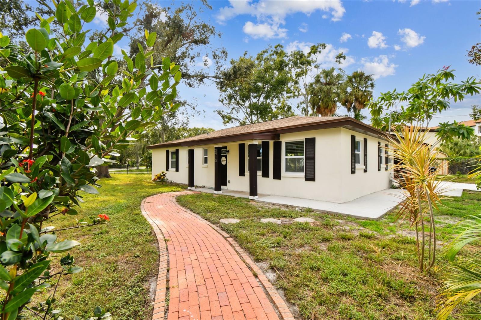 Welcome to this beautifully fully remodeled 3-bedroom, 2-bathroom block home in the heart of South Tampa, where modern upgrades meet timeless charm. Sitting on an extra-large 0.28-acre lot, this property offers rare space and privacy in one of Tampa’s most desirable neighborhoods.
Just minutes from MacDill Air Force Base, Downtown Tampa, and St. Petersburg, this home is filled with thoughtful details and stylish finishes. Step inside to a bright open-concept floor plan featuring brand-new luxury waterproof vinyl plank flooring throughout and new interior doors. The chef’s kitchen shines with custom cabinetry, sleek quartz countertops, and stainless-steel appliances, while the updated bathrooms feature high-end finishes with a designer’s touch. A separate indoor laundry room with washer/dryer hookups adds everyday convenience and functionality.
Besides all the cosmetic updates, this home has been completely transformed with a brand-new roof, windows, HVAC, plumbing, electrical, water heater, and a concrete driveway. The detached utility garage has been converted into a fully powered with electricity and equipped with a wall-unit AC workshop—perfect for hobbies, projects, or small business—yet can easily serve as a garage with side storage if needed.
Step outside and enjoy your huge fully fenced backyard with a private gate entrance—ideal for entertaining, gardening, or even adding a pool. The oversized lot provides endless possibilities to create your dream outdoor retreat.
Best of all, the property is located in a NO flood zone and comes with no HOA or CDD. With its prime location close to major highways, dining, shopping, and Tampa Bay’s best attractions, this move-in-ready home offers the perfect blend of comfort, character, and convenience.
Don’t miss your chance to own this South Tampa gem —schedule your showing today!