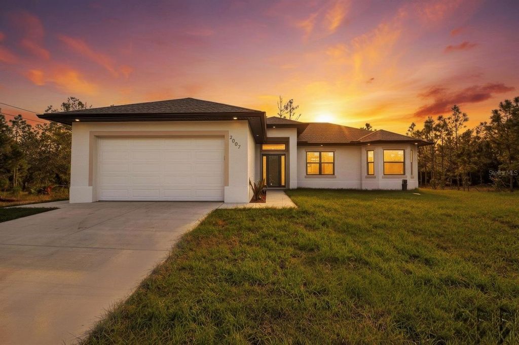 Photo of 2002 E 10th Street, Lehigh Acres, FL 33936 (MLS # TB8439709)